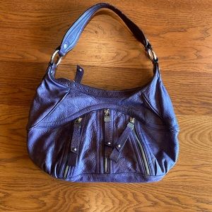 B.Makowsky purple hobo bag.